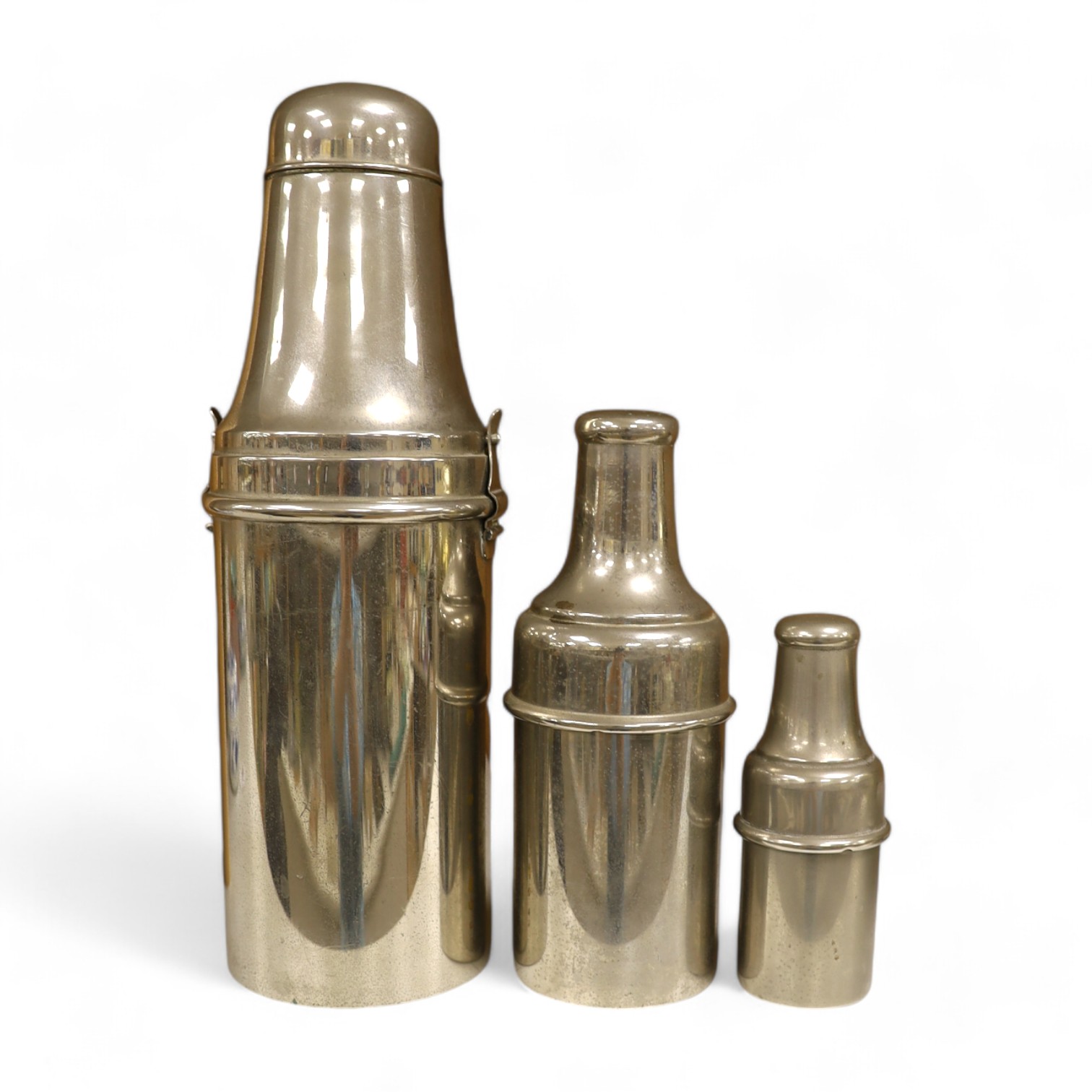 A 1920's chrome plated travelling cocktail flask set and two similar cased bottles, tallest 28.5cm high. Condition - fair